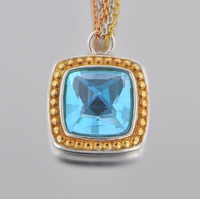 A Blue Topaz and Two Tone Gold b6590