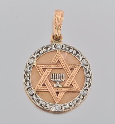 A Gold and Diamond Star of David Pendant