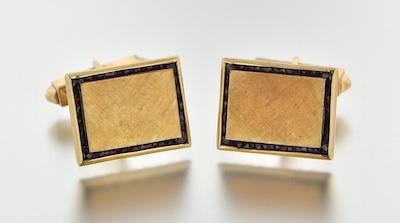 A Pair of Gold and Garnet Cufflinks