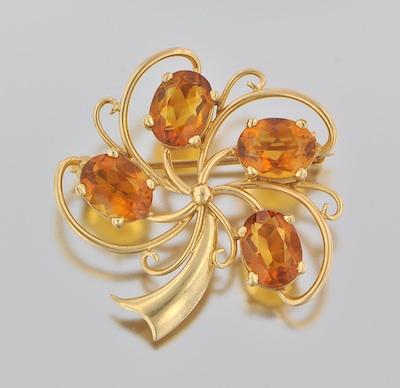 A Ladies' Citrine and Gold Brooch