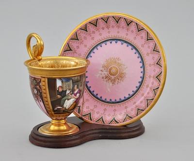 A Hand Decorated Porcelain Cabinet Cup