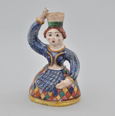 An Italian Glazed Ceramic Figure of