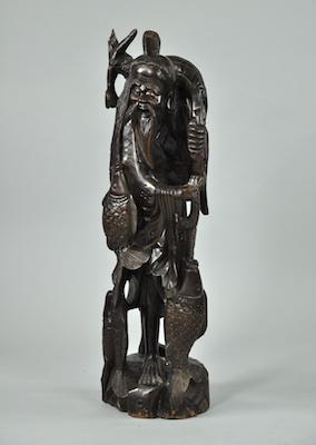 A Chinese Carved Wood Statue of