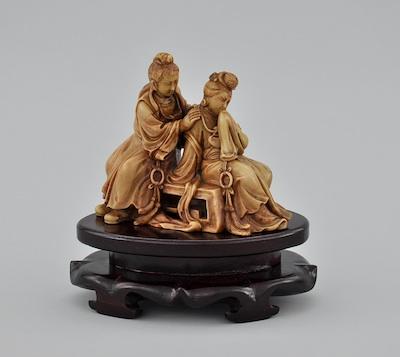 A Finely Carved Soapstone Figural