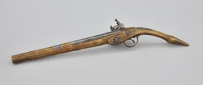 A Brass and Steel Flintlock Gun