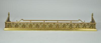 A Gilt Ornate Fireplace Fender Pierced