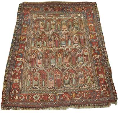 A Persian Carpet Approx. 6'-11"
