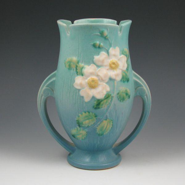 Roseville White Rose vase in blue.