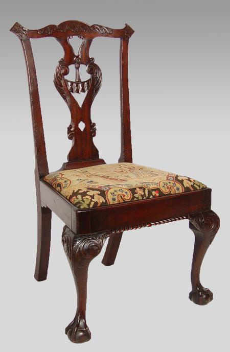 A CHIPPENDALE CARVED MAHOGANY SIDE