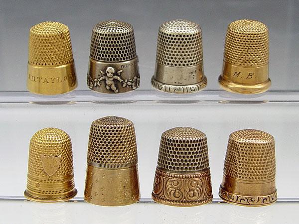 COLLECTION OF 8 STERLING AND GOLD b8157