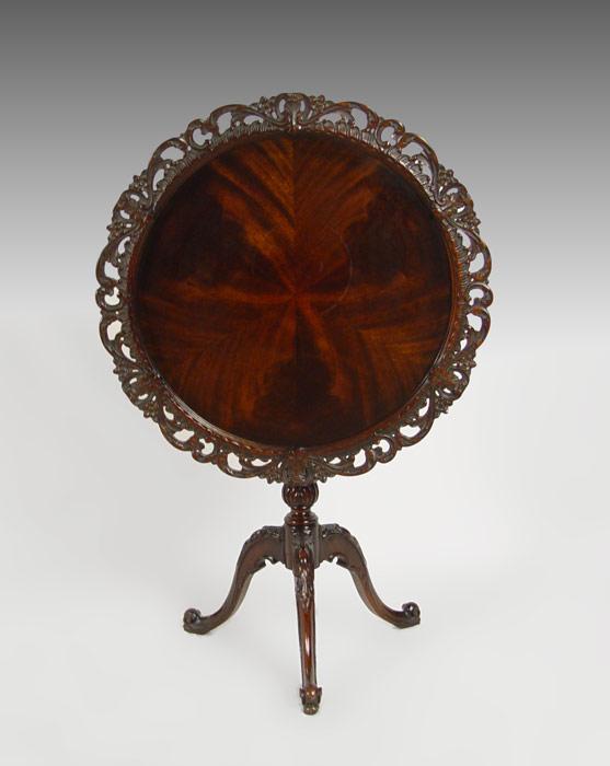 RICHLY CARVED MAHOGANY TILT TOP