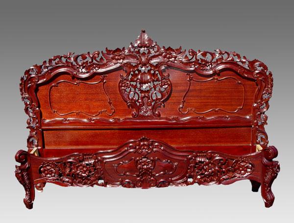 KING SIZED CARVED MAHOGANY BED: