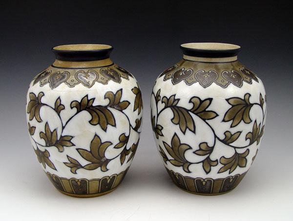 INTRIGUING PAIR OF ART POTTERY