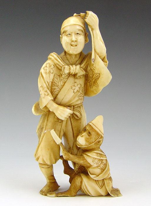 CHINESE CARVED IVORY FIGURE OF