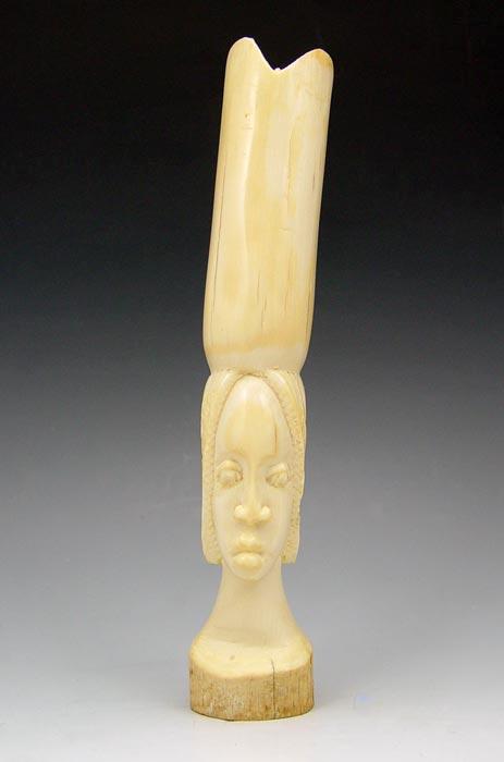 AFRICAN CARVED IVORY: Carved from