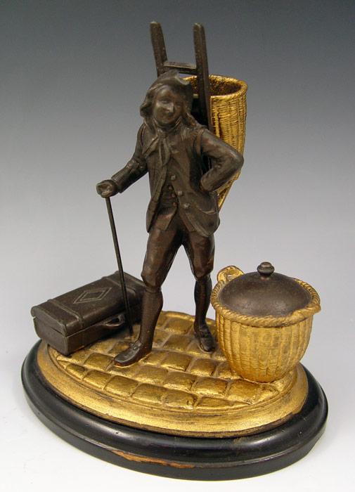 FIGURAL INK STAND: Colonist with