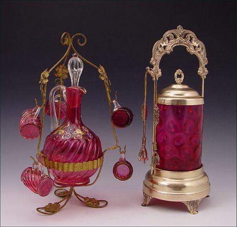 CRANBERRY GLASS PICKLE CASTOR AND DECANTER