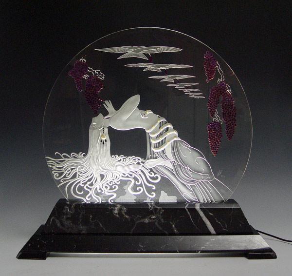 ERTE LUMINAIRE: Depicts a maiden eating