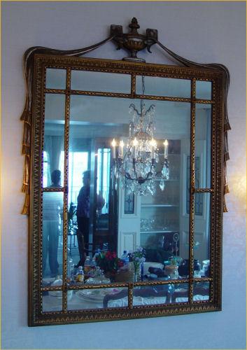 LARGE SILVER GILT MIRROR: Carved