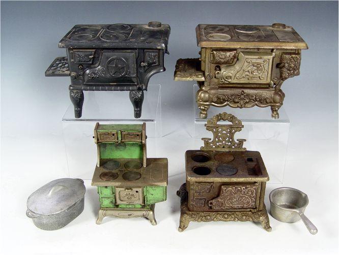 COLLECTION OF 4 CHILDS CAST IRON TOY