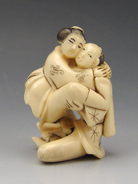 CARVED EROTIC IVORY SITTING COUPLE b94d8