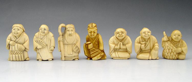 7 PIECE CARVED IVORY NETSUKES: