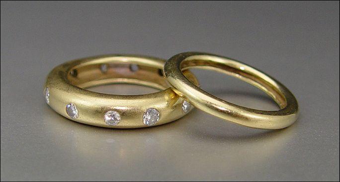 TWO 18K WEDDING BANDS, ONE WITH