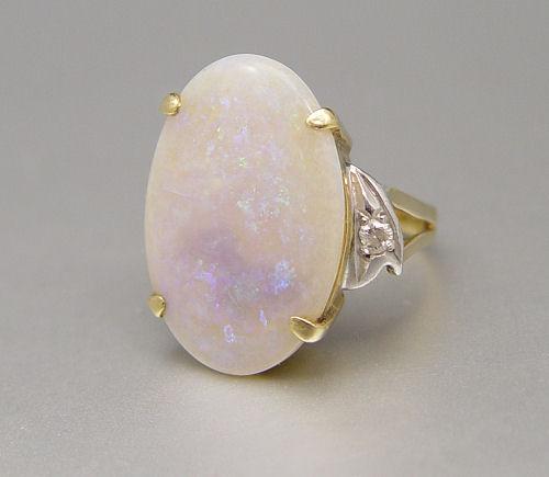 8 CT. OPAL WITH DIAMONDS RING: