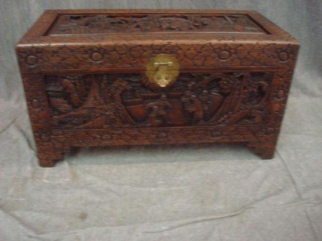 Highly Carved Asian Trunk. From a Long