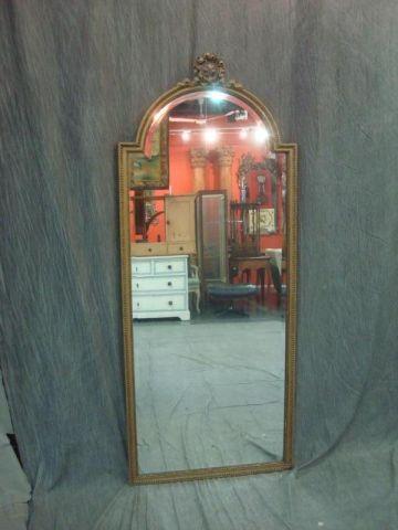 Ribbon Topped Mirror. From a Long