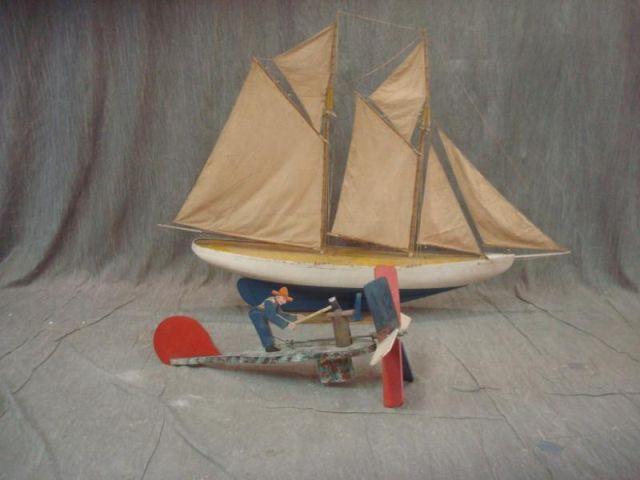 Antique Ship Model together with a Whirligig.