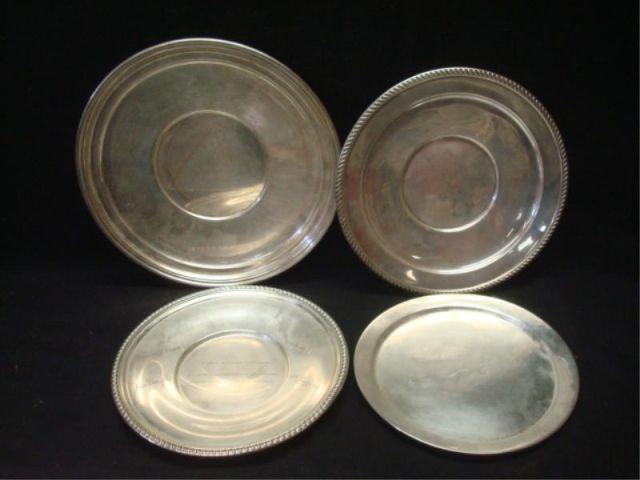 Sterling. 4 Plates of Assorted Sizes.