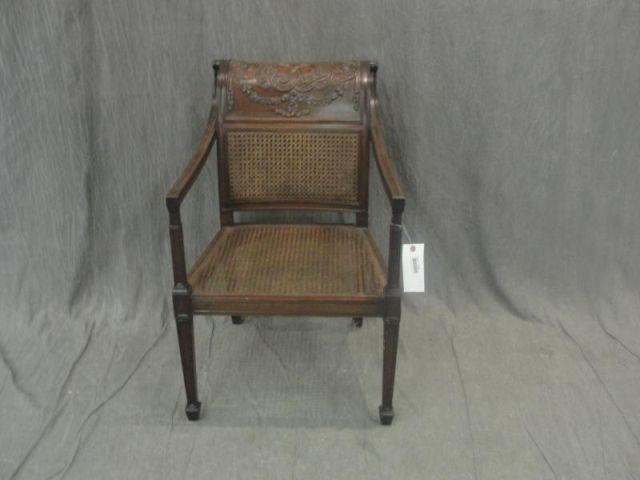 Caned and Carved Chair. From a Bronxville
