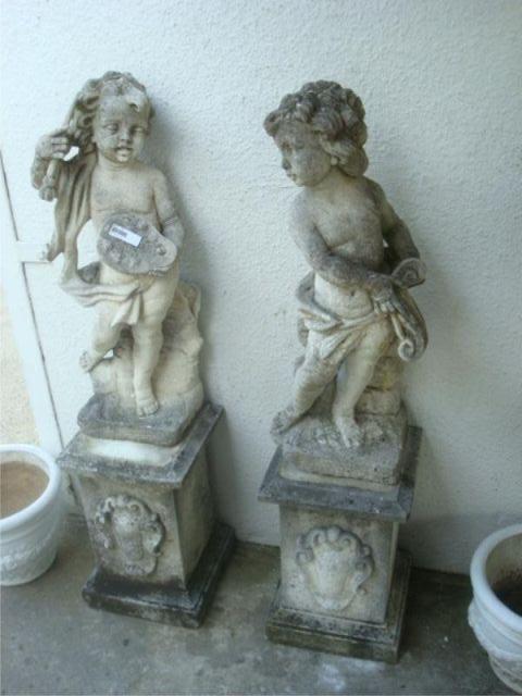 2 Concrete Statues. From a New