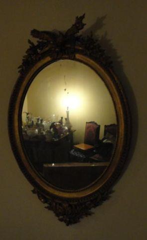 Oval and Giltwood 19th Century Mirror.