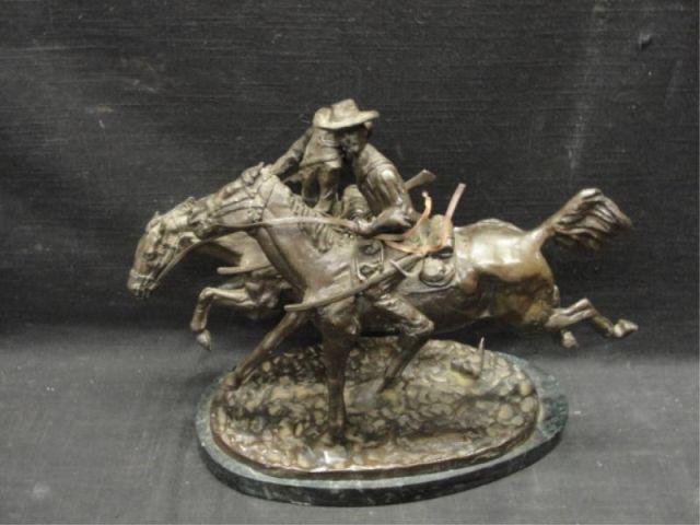 Remington Style Bronze Cowboys on Horseback.