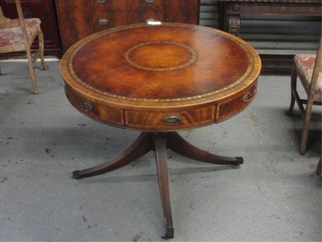 1 Drawer Leathertop Drum Table. From