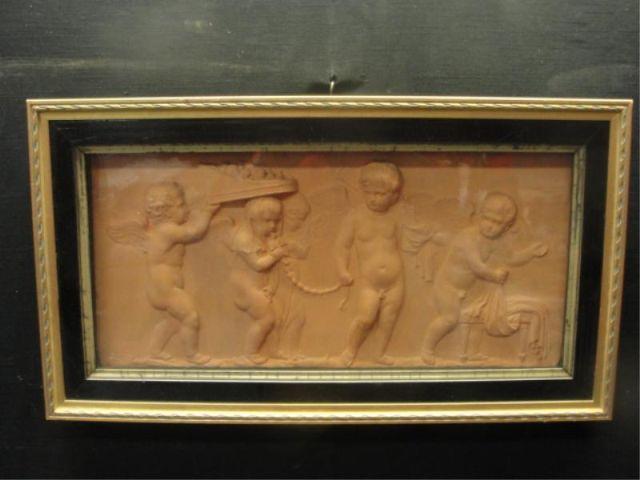 Framed Terracotta Relief of 4 Cherubs.