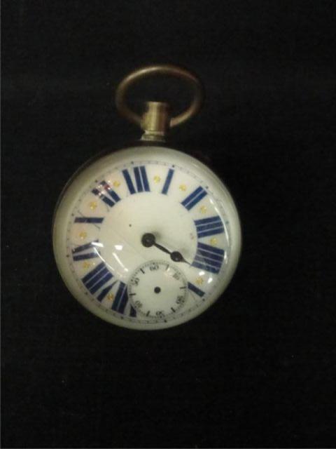Paperweight Clock with Enamel Face.
