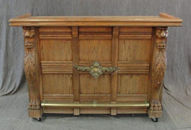 Antique Carved Oak Bar with Brass Top.