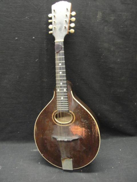 The Gibson Mandolin. Small splits on