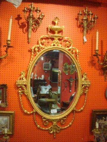 Ornate Oval Beveled Giltwood Mirror