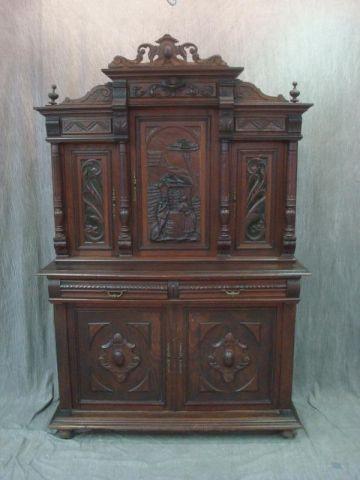 Carved Tudor Style Step Back Cabinet.