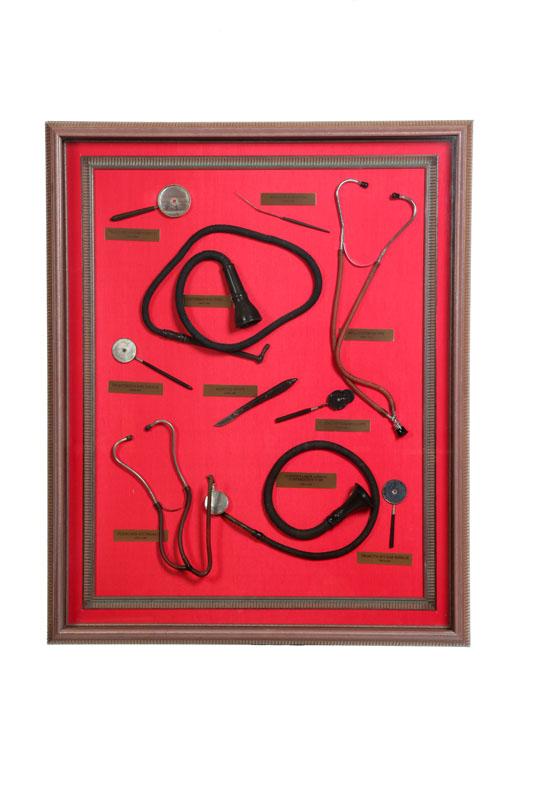 FRAMED GROUP OF MEDICAL INSTRUMENTS.