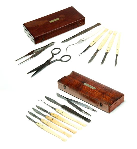 TWO CASED SCALPEL KITS.  American