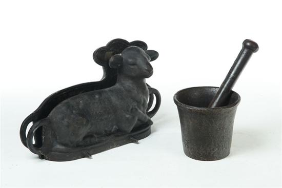 CAST IRON MOLD AND MORTAR AND PESTLE  1092e1