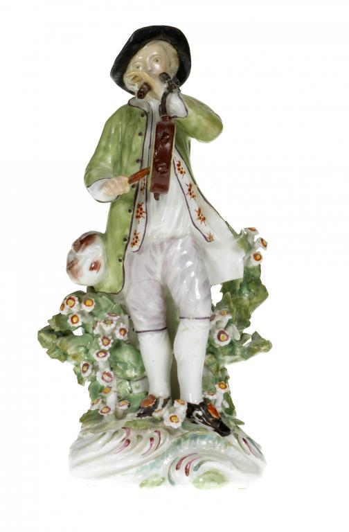 A DERBY FIGURE OF A MAN WITH FLAGEOLET