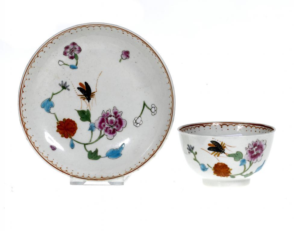 A WORCESTER TEA BOWL AND SAUCER enamelled 1093cb