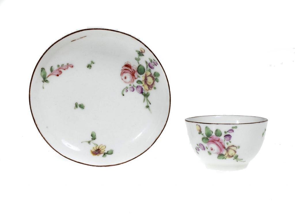 A DERBY TOY TEA BOWL AND SAUCER
enamelled