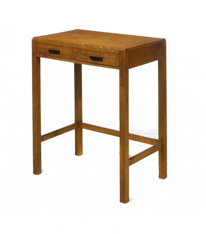 A COTSWOLD SCHOOL OAK SIDE TABLE
fitted